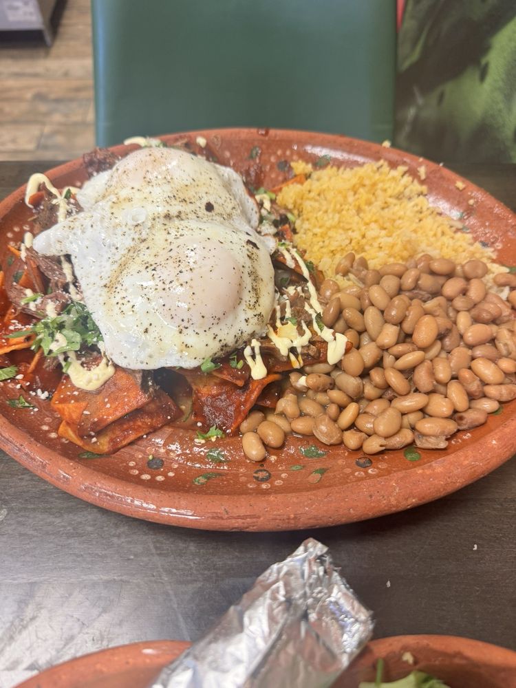 Chilaquiles topped with eggs