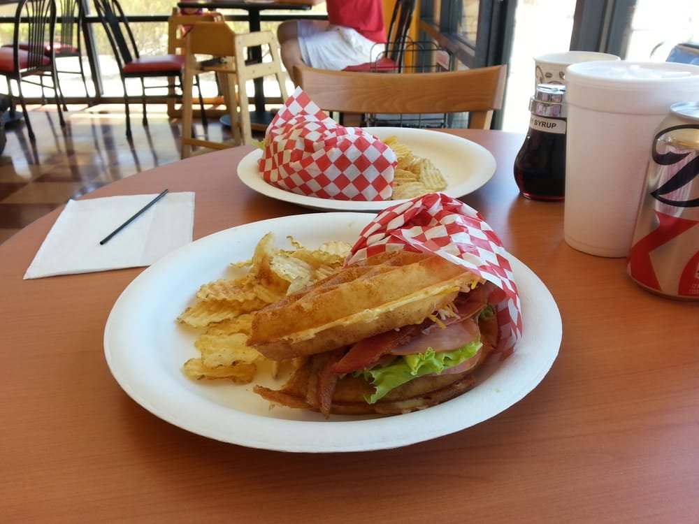 Ham and bacon waffle sandwich on a table in our dining room