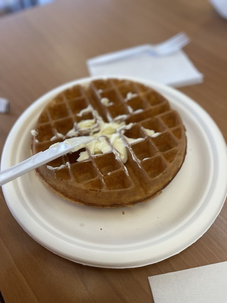 Our original Belgian waffle with a pat of real butter melting on top